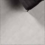 Vinyl flooring pattern in Aviano Stone design.